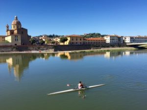 When traveling as a digital nomad, there's time for rowing along Florence's Arno River and visit Renaissance attractions on both sides of the river.