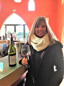Photo of author tasting some wine in Chateauneuf du Pape in Provence, France.