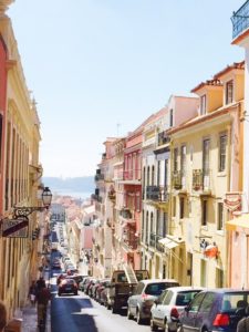 My apartment was on a Lisbon upper neighborhood street with colorful traditional buildings.  With a laidback vibe, it's a nice choice for where to stay in Lisbon neighborhoods.